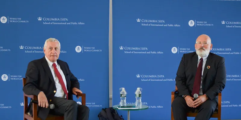 Timmermans and Vimont listen to a question.