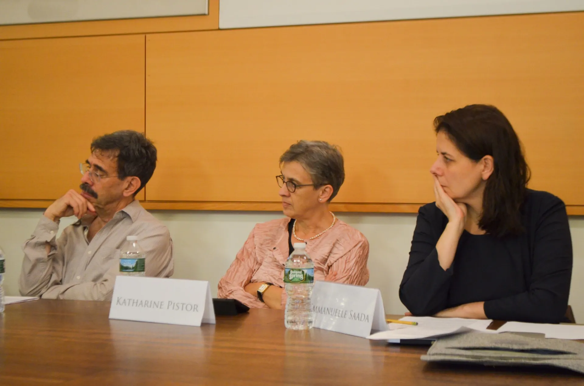 Panelists Fred Cooper, Katherine Pistor, and Emmanuelle Saada