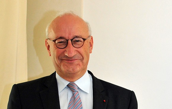 Philippe Etienne, Ambassador of France to the United States, smiles at the camera