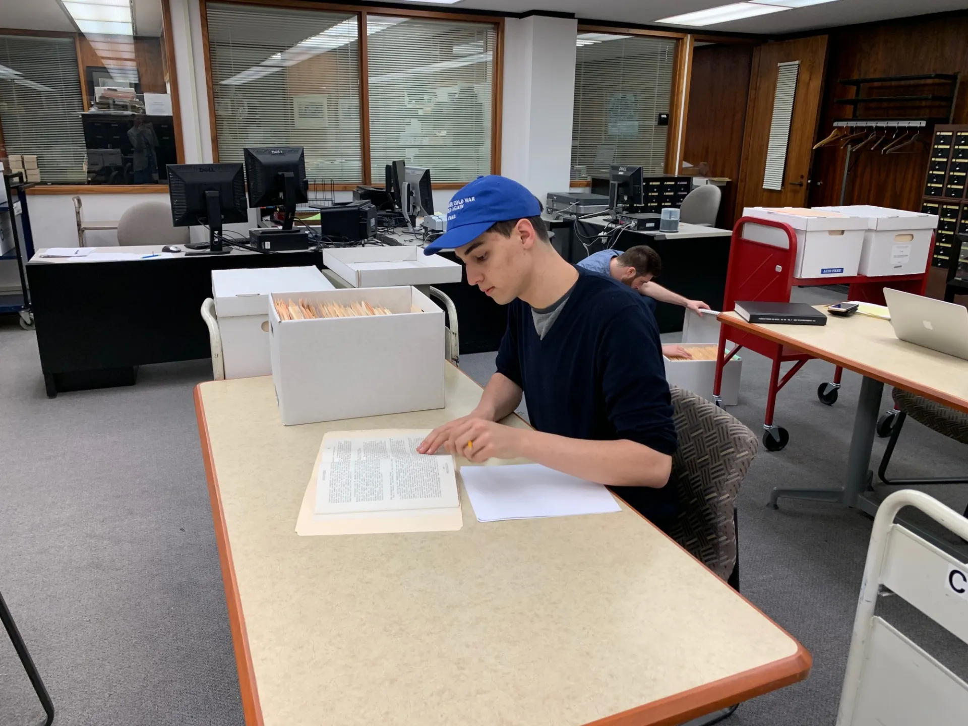 CWAR Fellow at work at the University of Arkansas Special archives