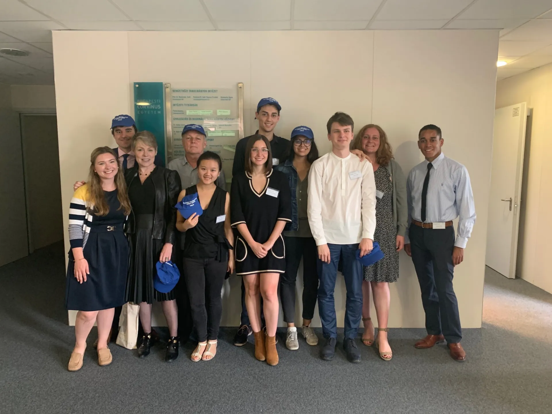 Professors Victoria Phillips and Csaba Bekes pose with CWAR Fellows and Corvinus students at the Budapest student conference